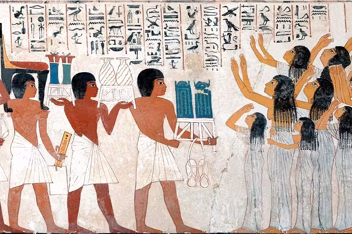 Ancient Egyptian tomb painting with hieroglyphs at Giza Plateau, included with skip-the-line site access ticket