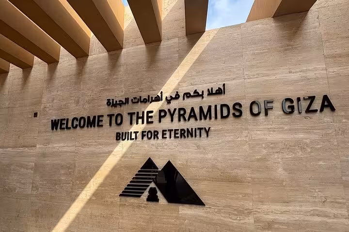 Entrance wall sign reading Welcome to the Pyramids of Giza, a key stop on Giza Saqqara Memphis day tour