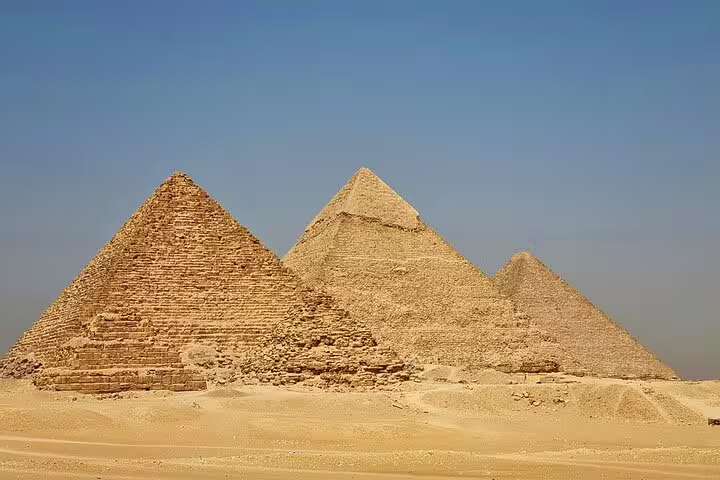 Three Pyramids of Giza in desert daylight, private layover tour from Cairo Airport with transfers