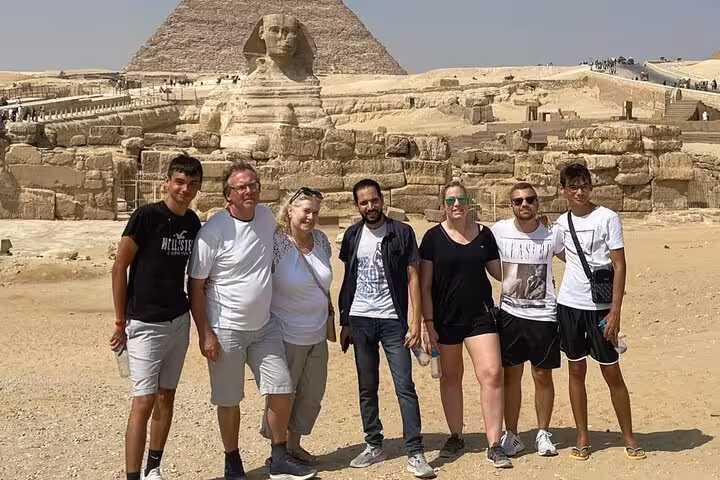 Tour group at the Great Sphinx and Pyramids of Giza on a private Cairo day tour with hotel pickup