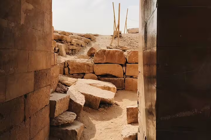Ancient stone passage at Giza pyramids complex, exploring hidden corridors on Cairo and Coptic Cairo day trip