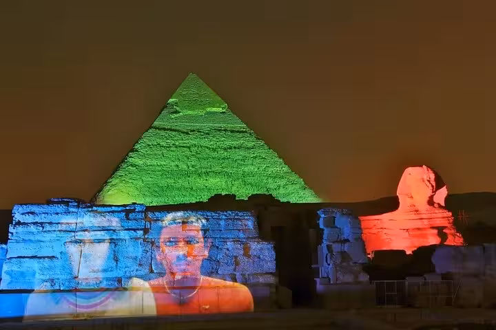Colorful Giza Sound and Light Show with Sphinx and Great Pyramid illuminated, Cairo dinner with pyramids view