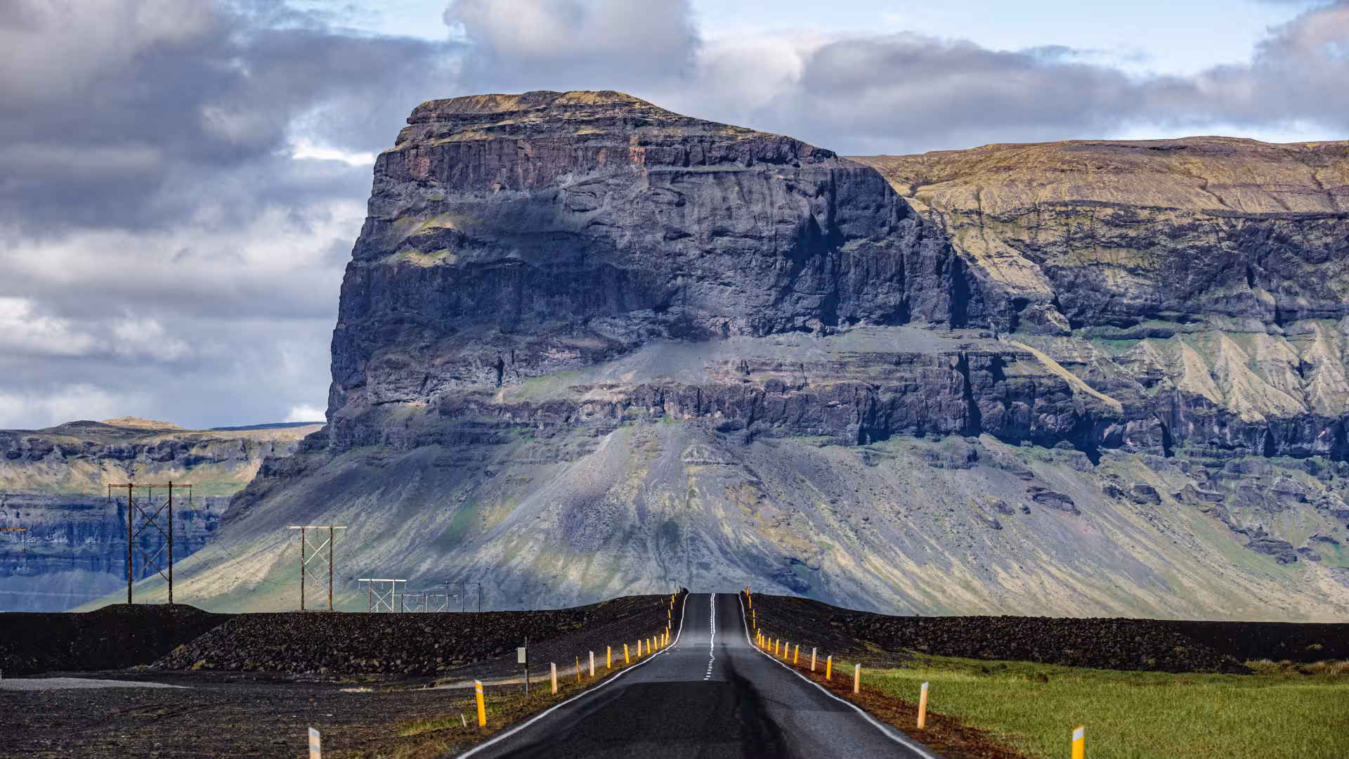Ring Road drive toward rugged Iceland cliffs on a Glacier Lagoon private rally car adventure scenic route
