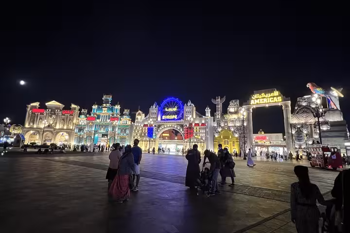 Night view of Global Village Dubai pavilions and lights, a top add-on with Ras AlKhaimah Adventure Await pass