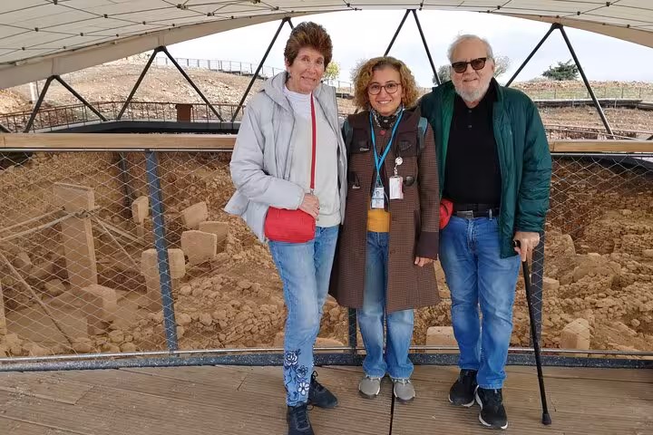 Travelers and guide on viewing platform at Göbeklitepe ruins, Şanlıurfa day tour from Istanbul all included