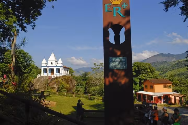 Historic church and cultural marker on the scenic Gold Trail Adventure, highlighting the rich history of Paraty.