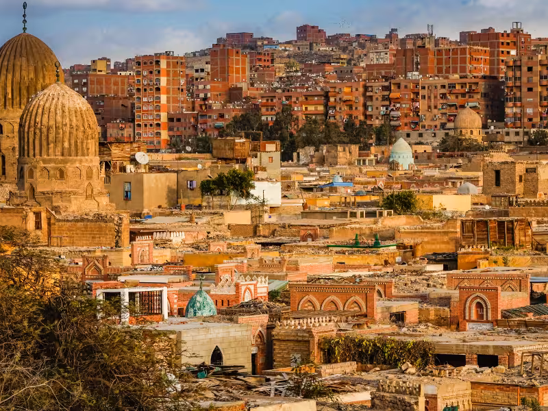 Historic Islamic Cairo skyline with mosque domes and old rooftops, Golden Cairo city tour highlights