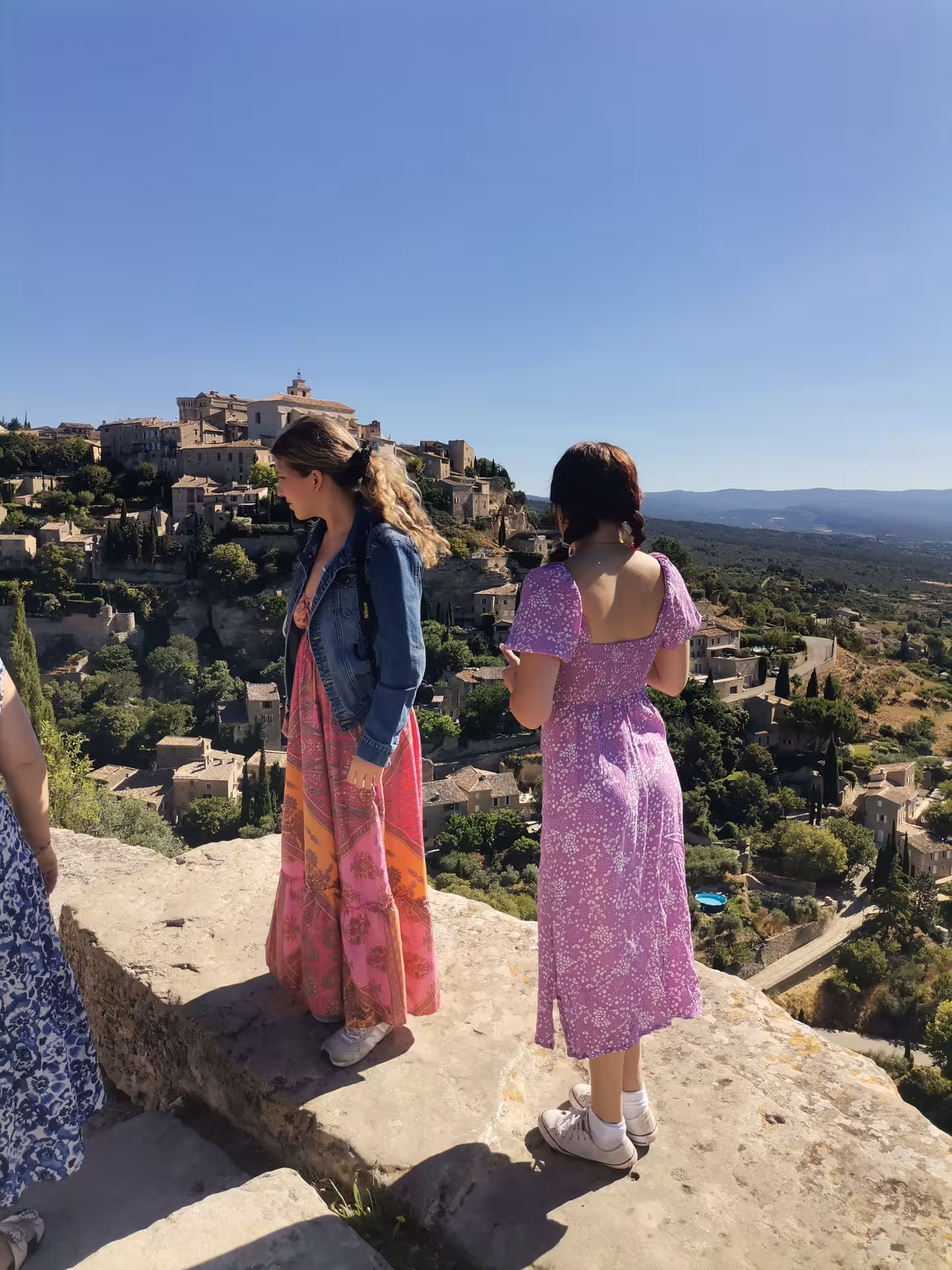 Travelers admire Gordes viewpoint in Luberon, France, a highlight of the Provençal Picnic Tour day trip