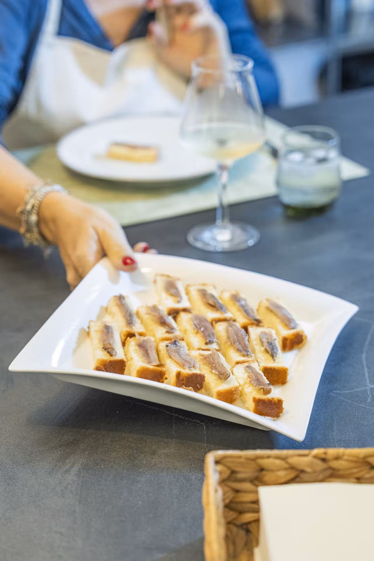 Elegant plate of gourmet appetizers served during exclusive private dinner with show cooking.