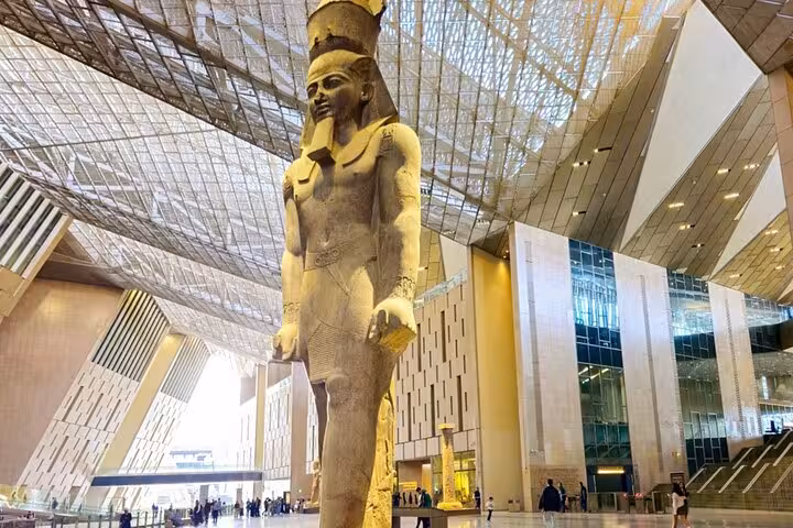 Grand Egyptian Museum Cairo statue hall, key stop on Hurghada to Cairo Pyramids Museum and Sphinx day tour