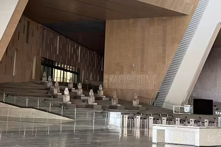 Grand Egyptian Museum entrance hall on private Cairo tour combining GEM highlights with Giza Pyramids and Sphinx