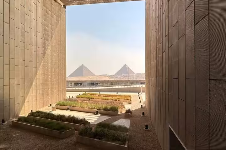 Grand Egyptian Museum terrace framing Giza Pyramids, Sharm El Sheikh to Cairo day trip by flight