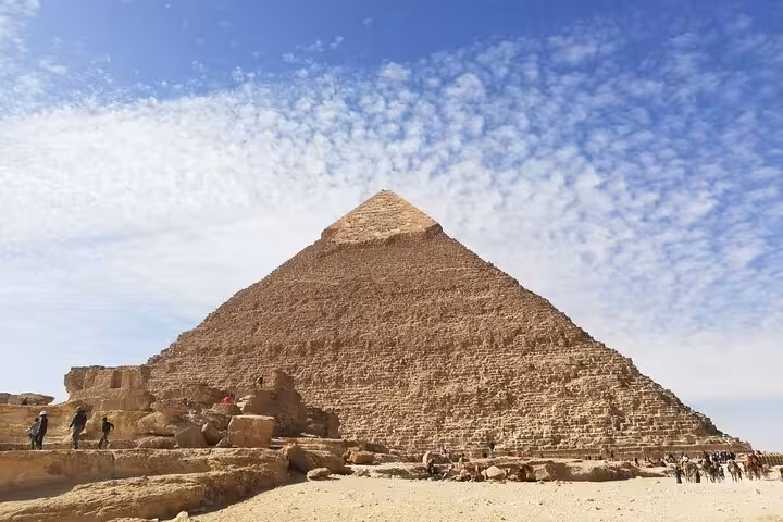 Close-up view of the Great Pyramid of Giza under blue sky, highlight of Ultimate 3 Day Cairo tour and museum