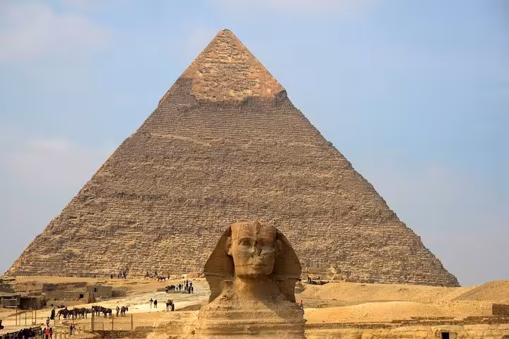 The Great Sphinx with the Pyramid of Khafre behind it, highlight of the all-inclusive guided Giza tour from Cairo