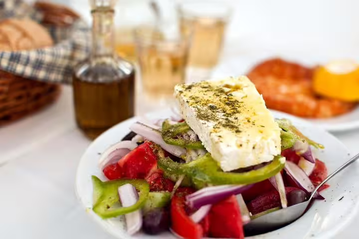 Greek salad with feta and olive oil, a classic stop on the Taste of Athens small-group morning food tour