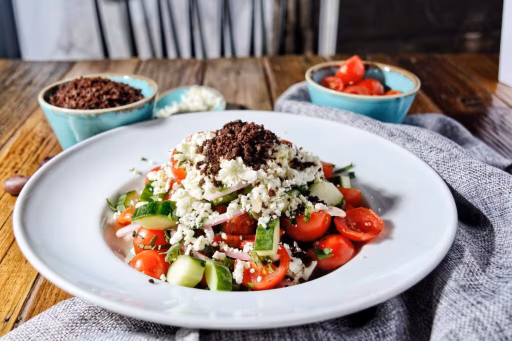 Traditional Greek salad with feta and olives, a classic tasting on a private Athens walking food tour