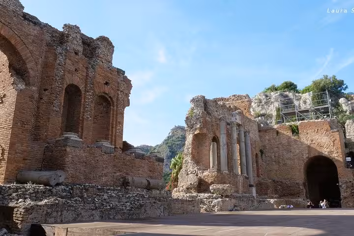 Detailed view of the ancient ruins in the Greek Theatre of Taormina, showcasing historical charm on the Etna tour.