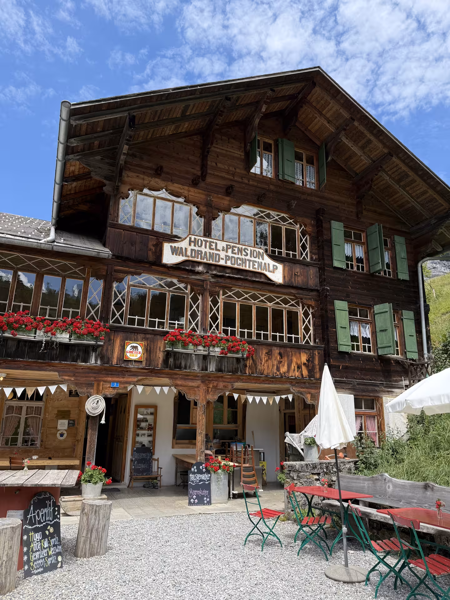 Traditional Swiss chalet inn in Griesalp, perfect stop on UNESCO alpine valley E-bike tour in Bernese Oberland