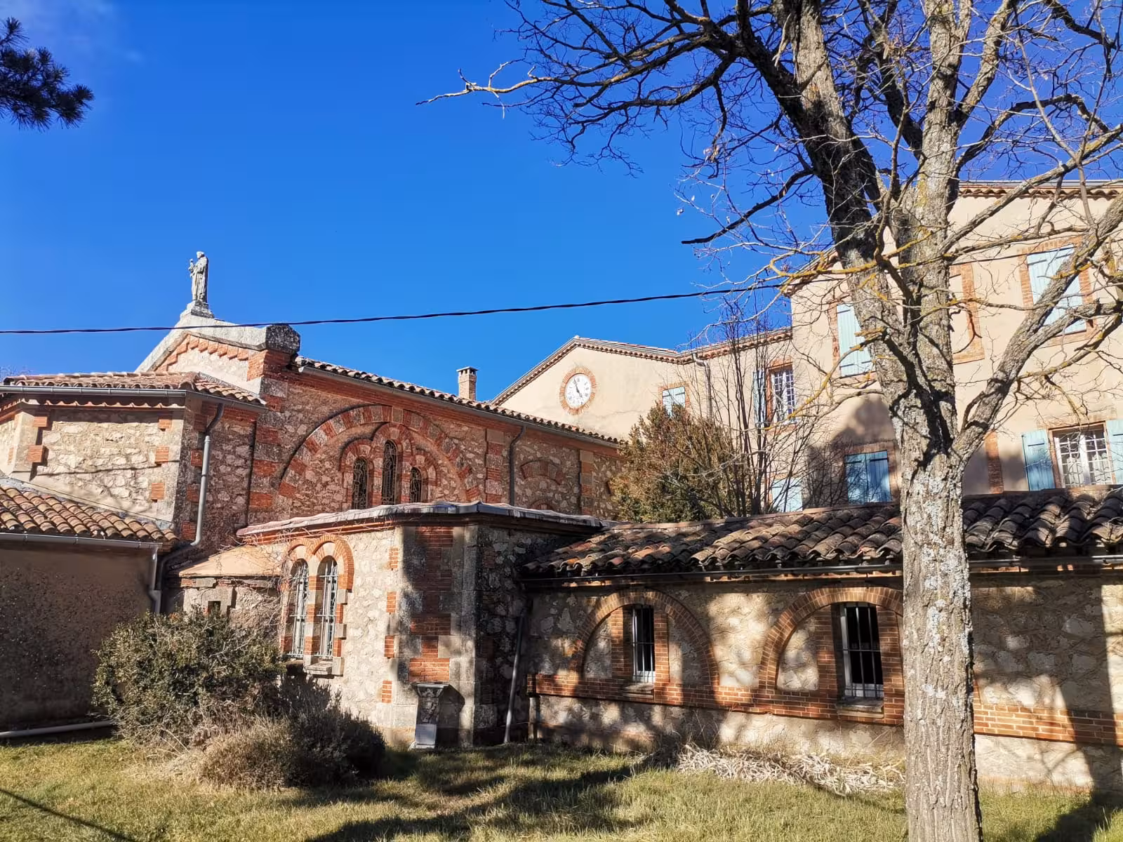 Stone chapel exterior near the trailhead for the sacred hike to Grotte Sainte-Madeleine in Provence, France