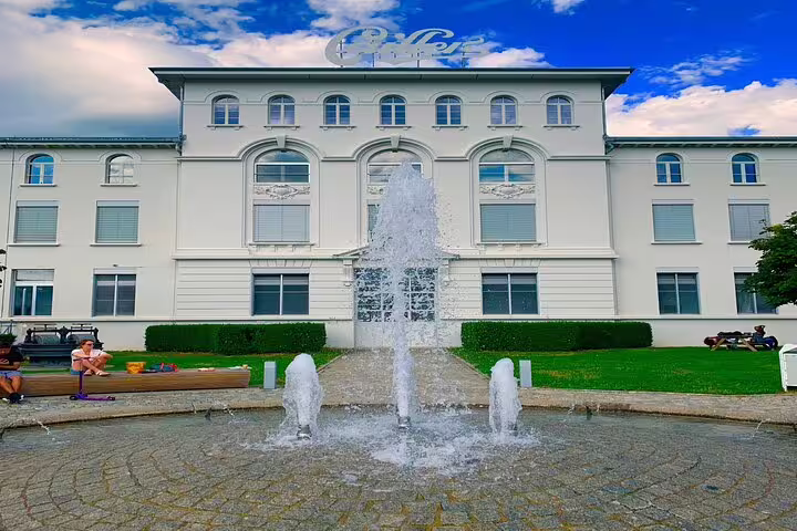 Explore the stunning facade of a historic building in Gruyères on the Zurich Small Group Tour.