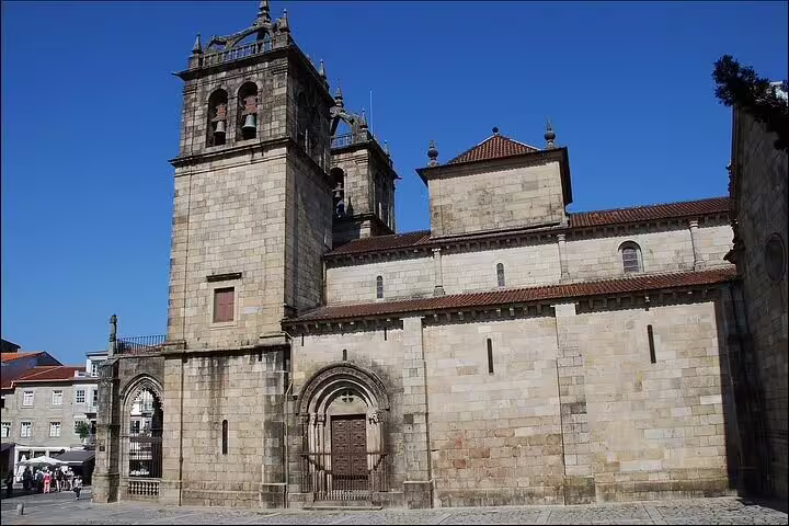 Historic church facade in Guimarães old town, cultural stop on Porto to Braga and Guimarães half-day tour