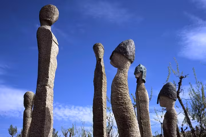 Unique stone sculptures under a clear blue sky in Guimarães, ideal for cultural exploration on a private half-day tour.