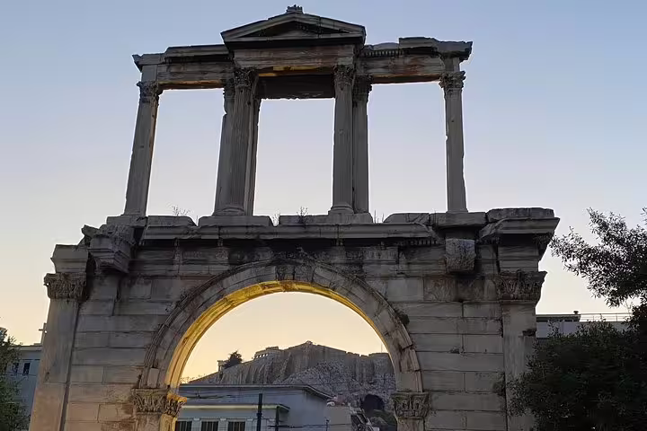 Hadrian’s Arch framing the Acropolis at sunset on Athens private walking tour with skip-the-line Acropolis entry