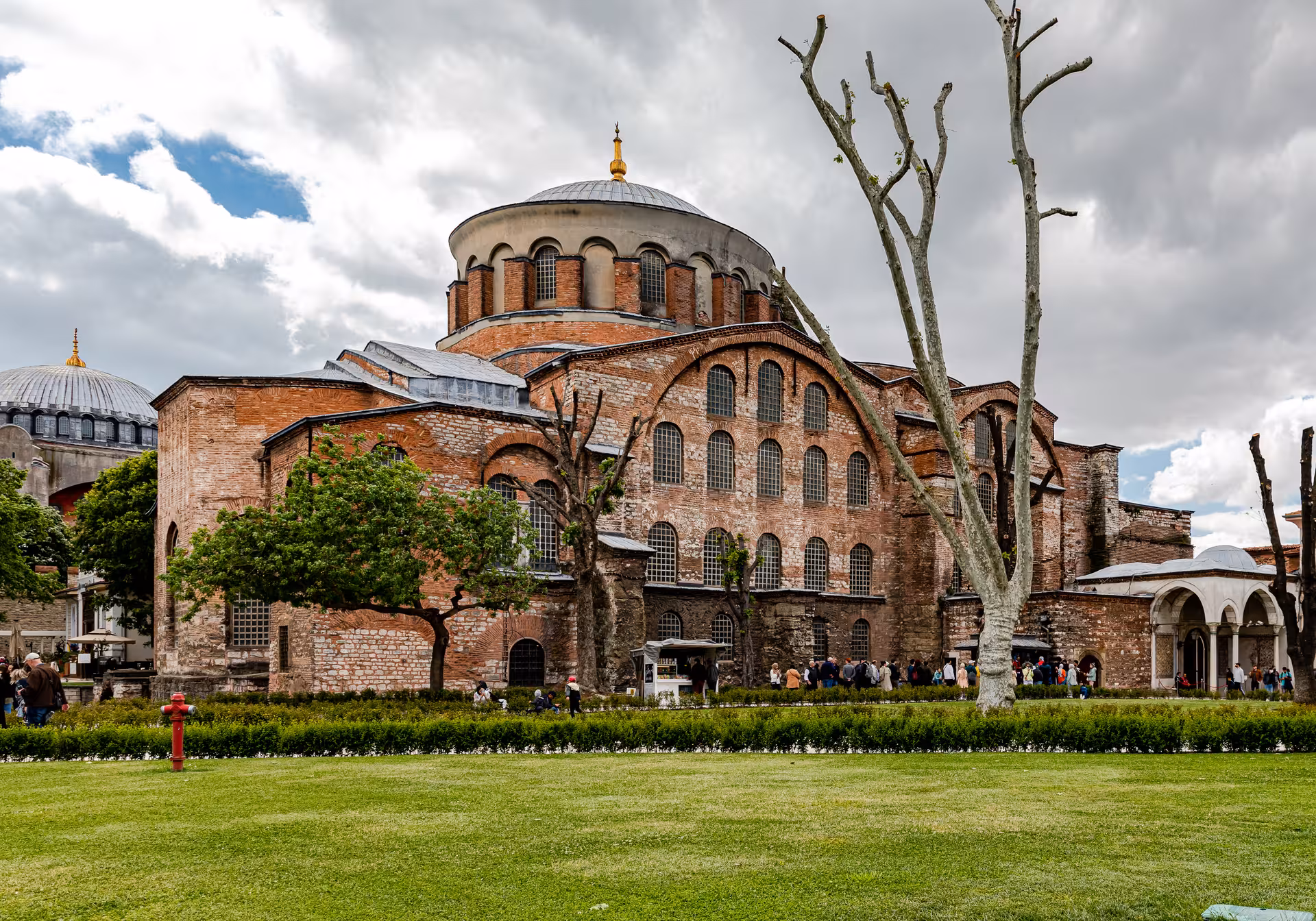Exterior of Hagia Sophia Museum in Istanbul with gardens and visitors on a 5-day Taste of Turkey trip