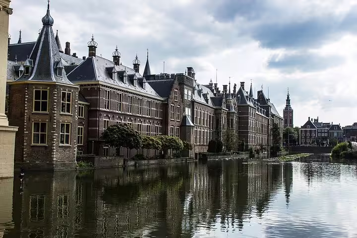 The Hague Binnenhof by the Hofvijver lake, scenic stop on Amsterdam to Rotterdam private tour with local expert