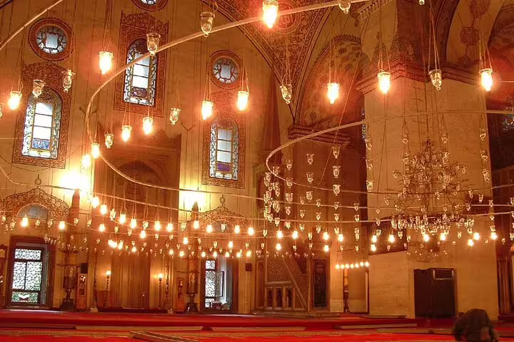 Hanging Church Cairo interior with ornate icons and chandeliers on Islamic and Christian Cairo day tour