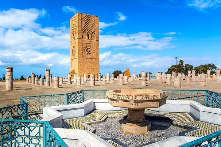 Hassan Tower in Rabat with mosaic fountain, a highlight on Morocco 11-day tour from Casablanca