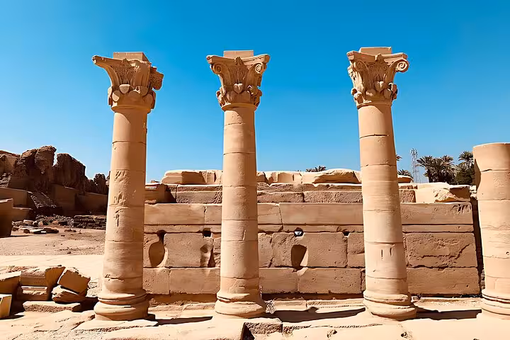 Sunlit Hathor Temple columns at Dendera, a highlight of the Dendera and Abydos full-day tour from Hurghada
