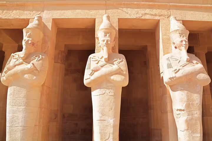 Hatshepsut Temple statues at Deir el-Bahari, highlight of 3 days 2 nights Luxor tour from Cairo by VIP train