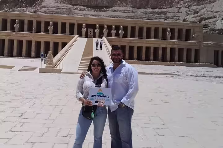 Travelers at Hatshepsut Temple, Luxor West Bank Nile tour stop with Deir el-Bahari colonnades