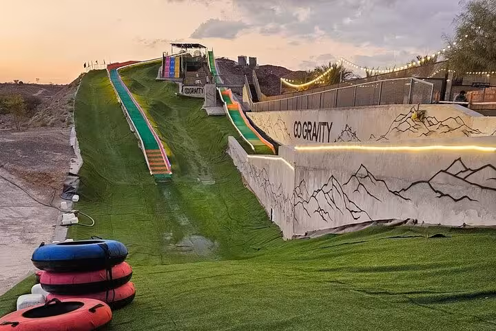 Hatta day tour stop at Gravity adventure park with tubing slides, part of private full-day Hatta excursion