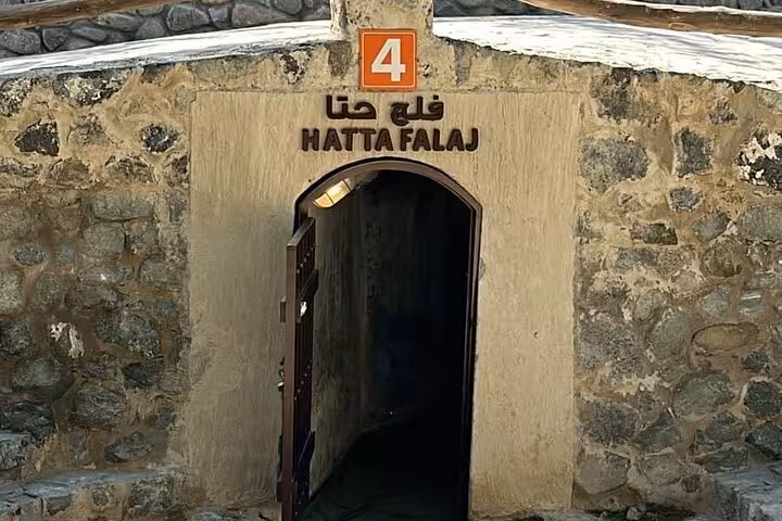 Entrance to Hatta Falaj irrigation tunnel at Hatta Heritage Village, highlight of a private full-day Hatta tour