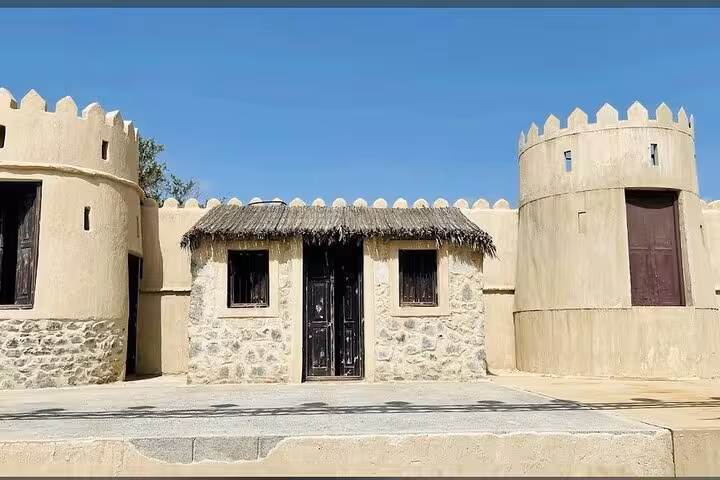 Traditional fort-style buildings at Hatta Heritage Village, a key stop on the Private Full Day Hatta Dam tour