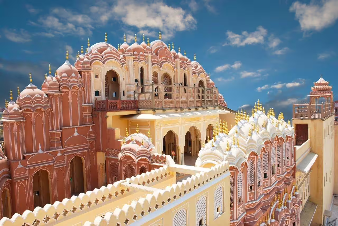 Discover the iconic Hawa Mahal in Jaipur, with its intricate pink sandstone façade, part of the Golden Triangle with Goa tour.