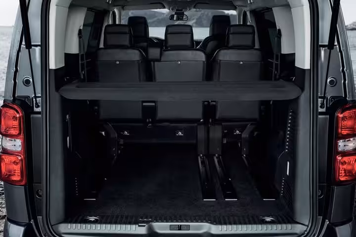 Large luggage trunk and seating in minivan for Heraklion to Rethymno hotel transfer, perfect for airport bags