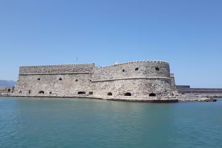 Historic Venetian fortress on a sunny day in Heraklion, Crete, showcasing stunning medieval architecture.