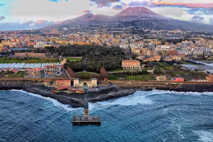 Enjoy stunning views of Mount Vesuvius and the coastline on a Herculaneum half-day excursion from Naples.