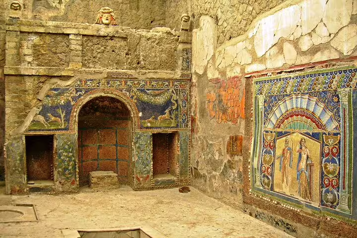 Colorful Roman mosaics and frescoes inside a preserved Herculaneum house visited on a personalized guided tour