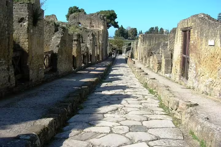 Ancient stone street and ruins in Herculaneum on a full day tour from Pompeii to Mt Vesuvius and local winery