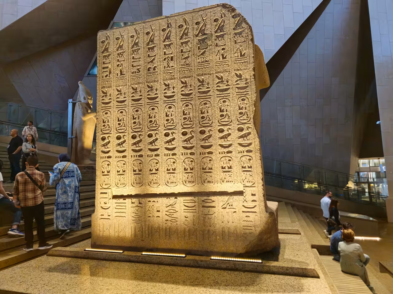 Ancient hieroglyph stone stela display at Grand Egyptian Museum Cairo on Hurghada to Cairo pyramids tour