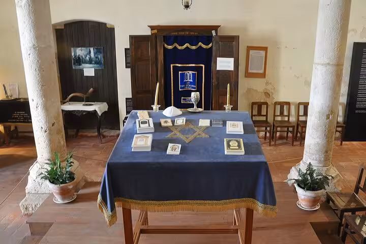 Historic synagogue interior in Tomar with traditional decor, ideal for cultural heritage tours and exploration.