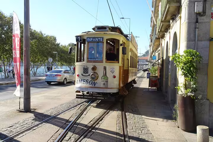 Historic tram in Porto city center, a highlight of the private tour from Lisbon.