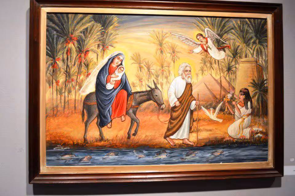 Framed painting of Mary and Jesus on a donkey with Joseph in Egypt, inspiring The Holy Family Trip tour