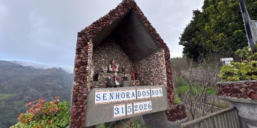 Beautiful shrine with religious figures on the holy wine tour, offering panoramic views of the scenic landscape.