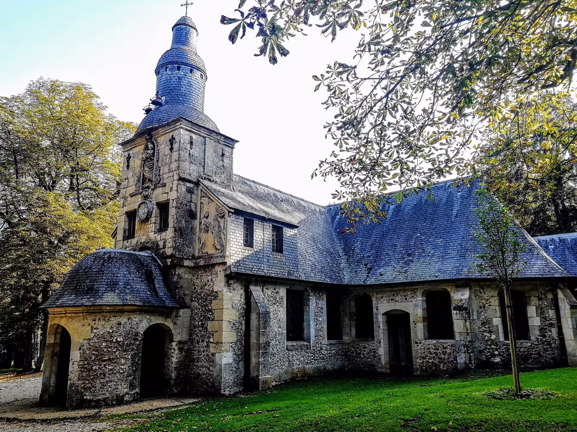 Historic stone church near Honfleur on a guided electric bike tour through Normandy countryside and landmarks