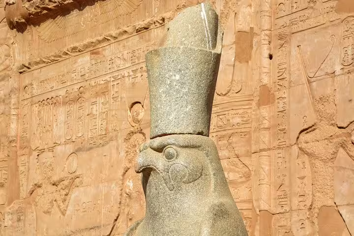 Falcon-headed Horus statue relief at Edfu Temple, ancient Egypt stop on 5 days 4 nights Splendours of the Nile tour